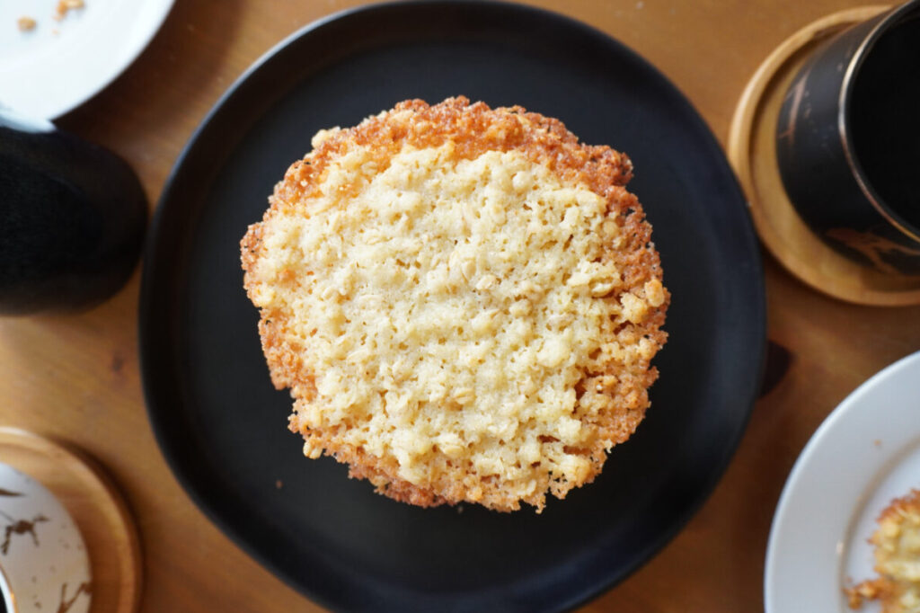 buttery oatmeal stacked on a plate