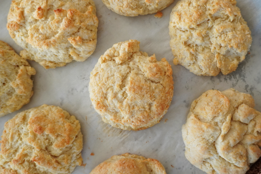 a baking pan of golden buttery biscuits