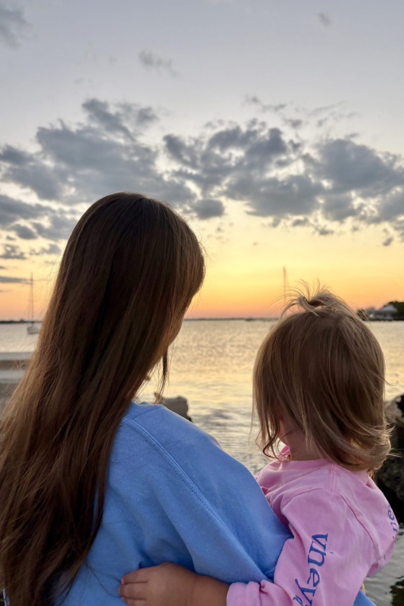 Calia and Mama looking out at sunset